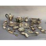 Silver plated ware including a casserole stand, milk jug, teapot, hot water jug, two trays,