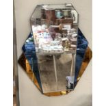 An Art Deco wall mirror with blue and amber side panels
