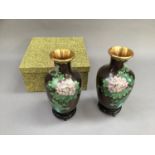 A pair of 20th century Chinese cloisonné vases of shouldered ovoid outline enamelled with rocks
