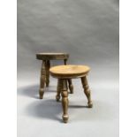 A cobbler's pine three legged stool together with another in beech