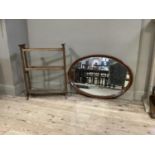 An Edwardian oak towel rail together with an Edwardian inlaid wall mirror with boxwood stringing and