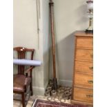 A Victorian curtain pole with turned and knopped finials, with sixteen rings, 193cm long overall