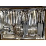 A suite of silver plated cutlery comprising six dinner knives, six dinner forks, six entrée or