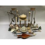 A quantity of metal ware including brass and copper, trivets, bellows, hearth fire items, posser,