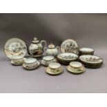 A Japanese egg shell china tea service and two other cups and saucers