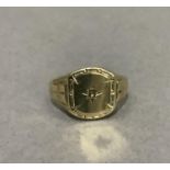 A signet ring c.1960 in silver gilt set to the centre with a small rose cut diamond