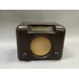 A Bush radio type DAC90A in brown Bakolite case, 23cm high by 30cm wide