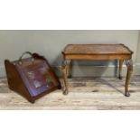 An Edwardian walnut coal box with brass hoop handle together with a walnut coffee table of