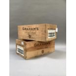 Two wooden port crates stamped Graham's Vintage Port 1979 and 82, measuring 41cm wide x 23.5cm