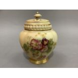 A Royal Worcester pot pourri vase of lobed ovoid form having a pierced beaded cover with knop
