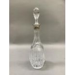 A silver collared cut glass decanter by Mappin & Webb, London import mark for 1980, 38cm high approx
