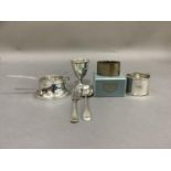 Two silver napkin rings, one initialled DPH, the other plain, Birmingham 1938 and 1963, silver egg