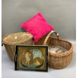 Two wicker log baskets, a two handled tray and two raspberry coloured scatter cushions