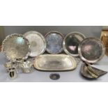 Silver plated ware including various circular trays, large oblong two handled tray, small coaster