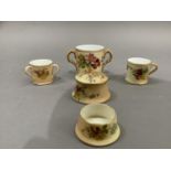 Five items of Royal Worcester blush ivory printed and painted with sprays of flowers, to include a