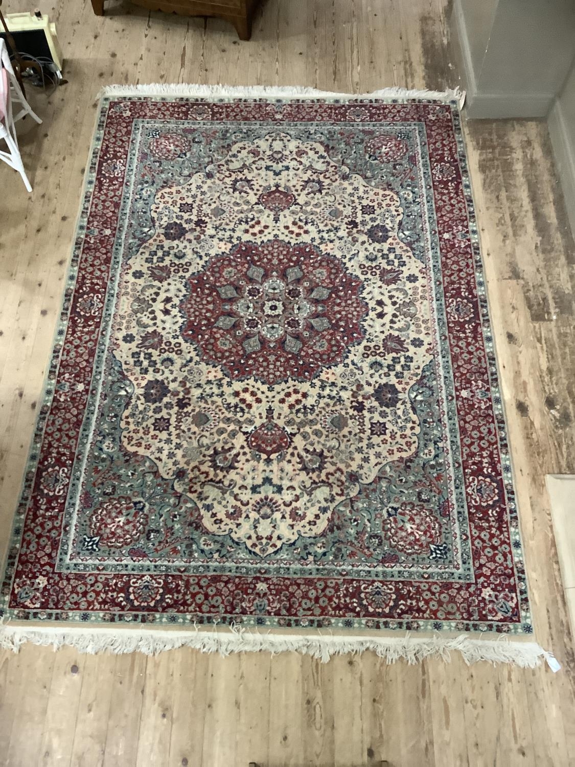 A wool carpet of Persian design in red, pale camel, green and blue, 293cm x 205cm - Image 2 of 4