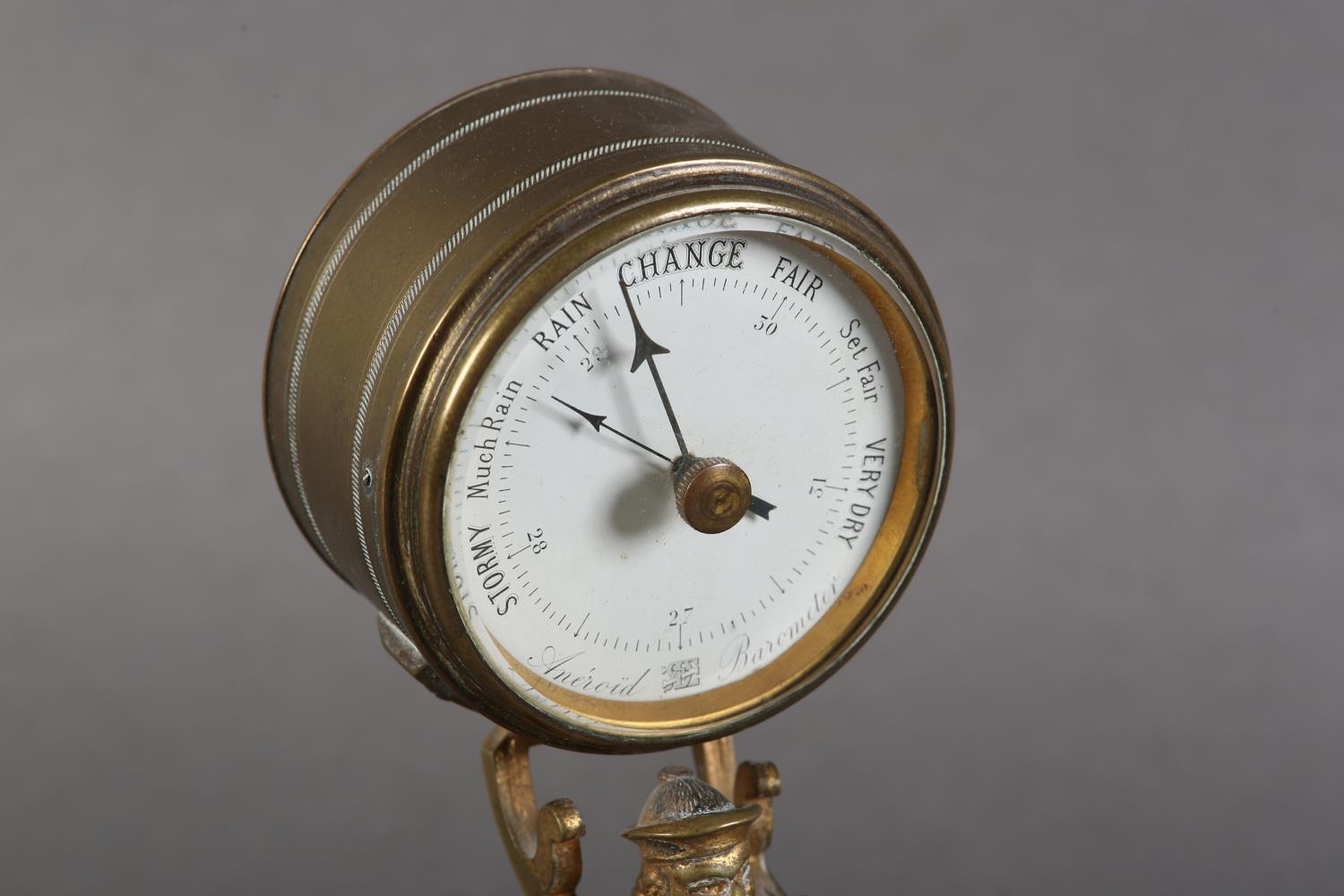 A late 19th century gilt-brass desk barometer, the drum casing held aloft by the figure of a China - Image 9 of 12
