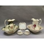 Two early 20th century toilet jugs and bowls and items of floral and gilt tea ware