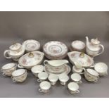 A Royal Doulton dinner, tea and coffee service of Canton design, comprising eight dinner plates,