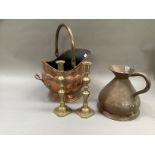 A copper coal scuttle, a copper measure and a pair of baluster candlesticks