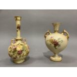 A Royal Worcester two handled vase having a trumpet shaped neck and ovoid body with handles to the