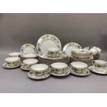 A Royal Doulton Larchmont dinner and tea service comprising twelve dinner plates, twelve dessert