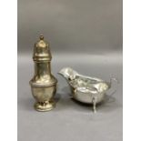 A Viners silver sauceboat with bracketed rim and paw feet, Sheffield 1957, 3oz, together with a