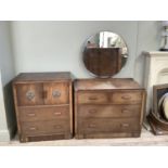A two piece oak bedroom suite comprising dressing chest of two short and two long drawers with