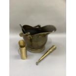 A brass helmet coal scuttle, a spill vase, shovel etc together with a Fortnum and Mason wicker