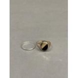 An onyx set signet ring in 9ct gold, finger size U, approximate weight 3g, together with a silver