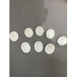 A set of eight 19th century Italian plaster intaglio reliefs of Roman Emperors, oval, pierced for