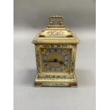 A mid 20th century bracket style boudoir clock of crackleglaze finish with sprays of flowers,