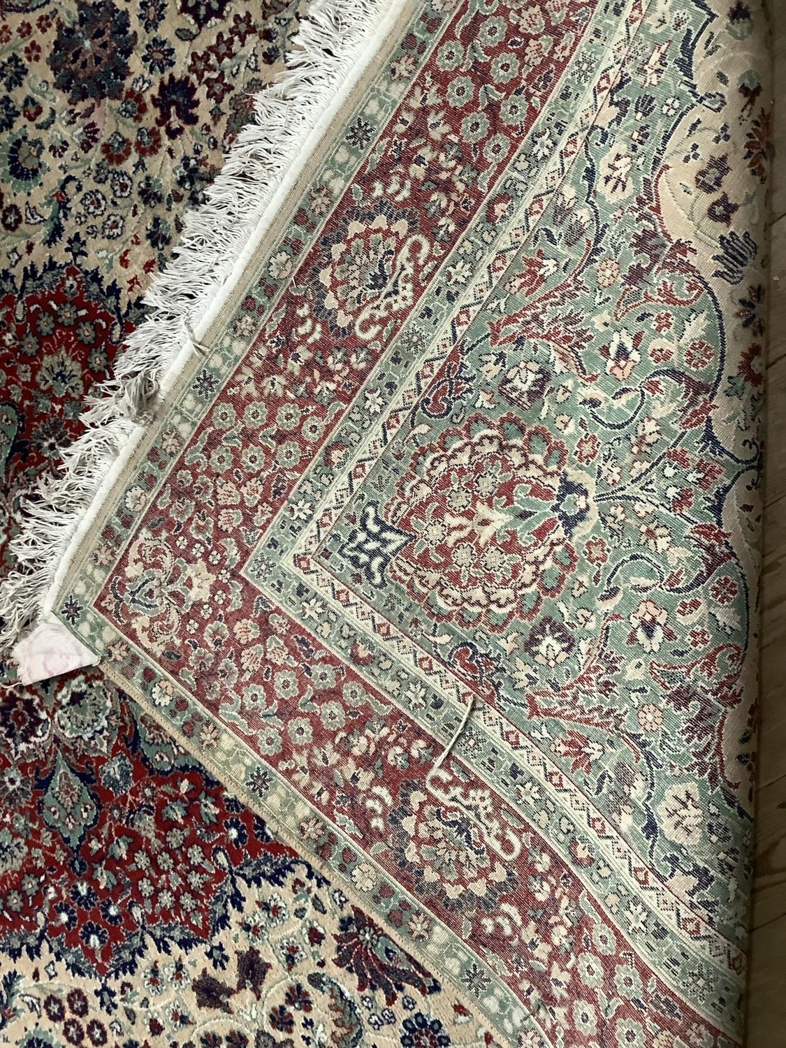 A wool carpet of Persian design in red, pale camel, green and blue, 293cm x 205cm - Image 3 of 4