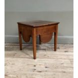 An oak commode now converted to a table with lift up lid, shallow well and with deep apron on square