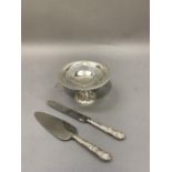 A silver bon bon dish of pierced design on pedestal foot, Birmingham 1935, 4oz, together with a