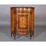 A 19TH CENTURY DUTCH WALNUT MARQUETRY BOW FRONTED CUPBOARD of serpentine outline in satinwood and