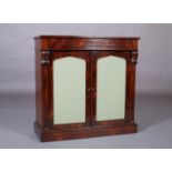 A MID 19TH CENTURY ROSEWOOD BOOKCASE, having a frieze drawer above two arch panelled doors lined