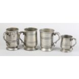 THREE GEORGE IV PEWTER PINT TANKARDS and one half pint tankard, stamped for James Yates of