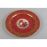 A ROYAL WORCESTER FRUIT PAINTED PLATE, signed E Townsend to a central reserve painted with peached