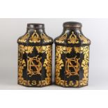 A PAIR OF 19TH CENTURY TOLEWARE TEA CANISTERS, octagonal, the black ground gilt with scrolling
