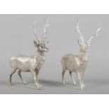 A PAIR OF ELIZABETH II SILVER STAGS by Biggins of Sheffield, date letter illegible, 14.5cm high,