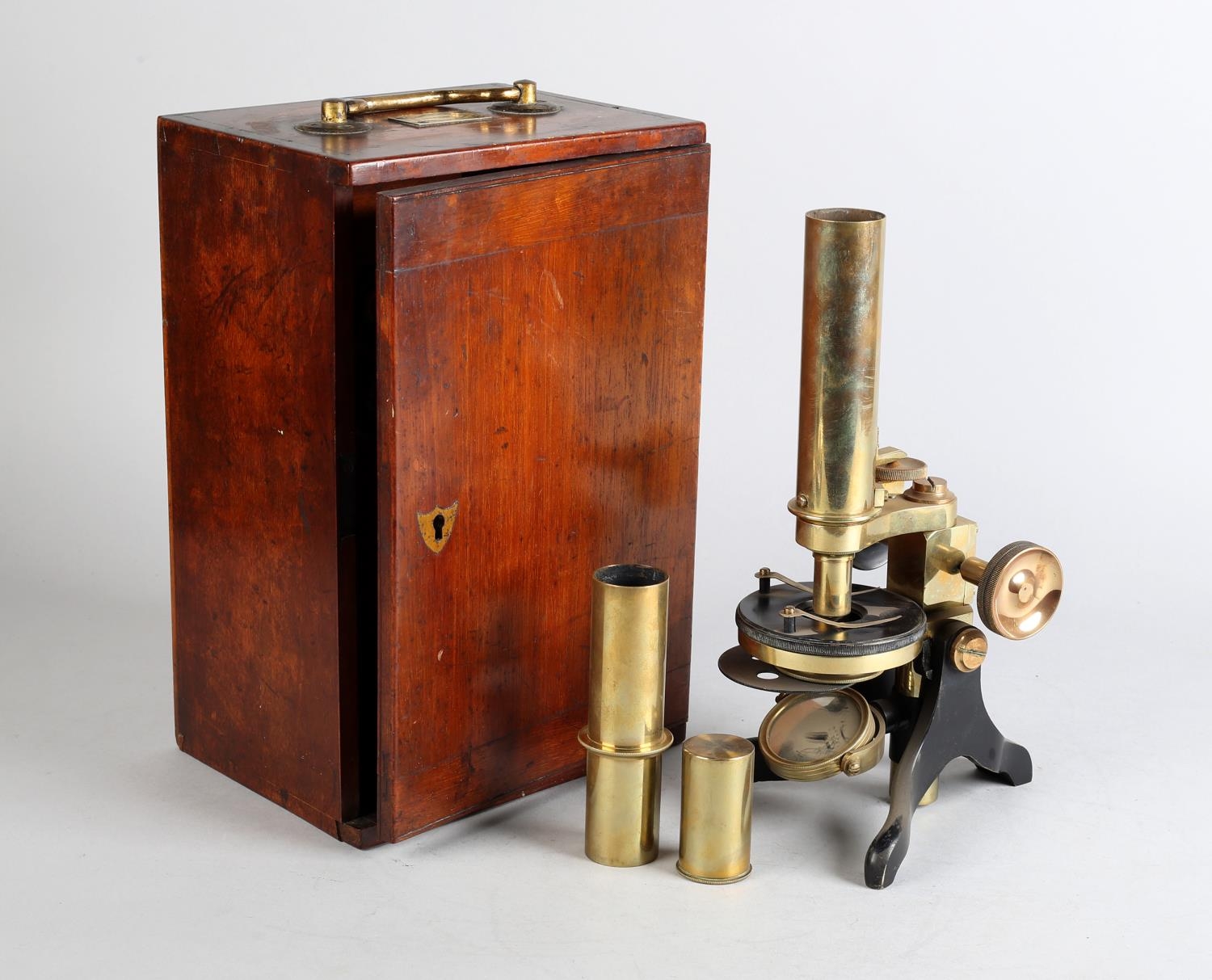 A VICTORIAN BRASS MICROSCOPE BY H HUGHES & SON, 59 Fenchurch St, London, with additional lenses in a