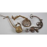 THREE LATE VICTORIAN SCONCES IN BRASS AND COPPER, of foliate design, various sizes