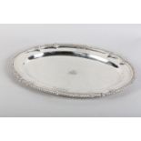 A LATE GEORGE III SILVER MEAT DISH BY PAUL STORR, London 1818, oval shaped outline with gadroon rim,