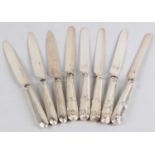 A MATCHED SET OF EIGHT IRISH SILVER DESSERT KNIVES maker's mark Harry & Samuel Neville, Dublin c.