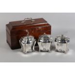 A GEORGE III BOXED SET OF THREE SILVER CADDIES BY DANIEL SMITH & ROBERT SHARP, London 1764, of bombe