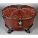 A GEORGE IV MAHOGANY WINE COOLER, POSSIBLY IRISH, C.1830, oval, the reeded cover with beaded finial,