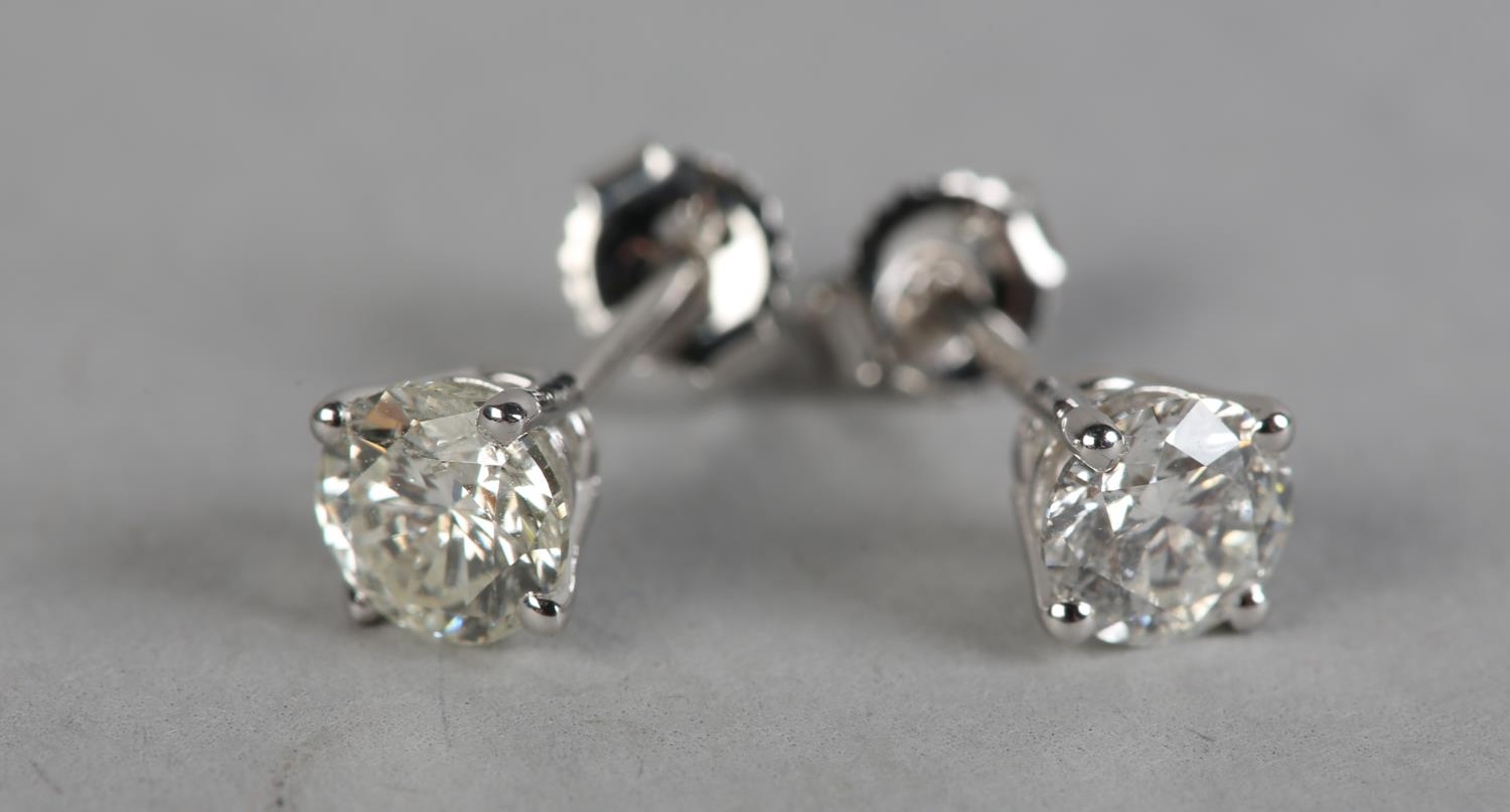 A PAIR OF DIAMOND STUD EARRINGS in 18ct white gold, each claw set with a brilliant cut stone on post - Image 2 of 4