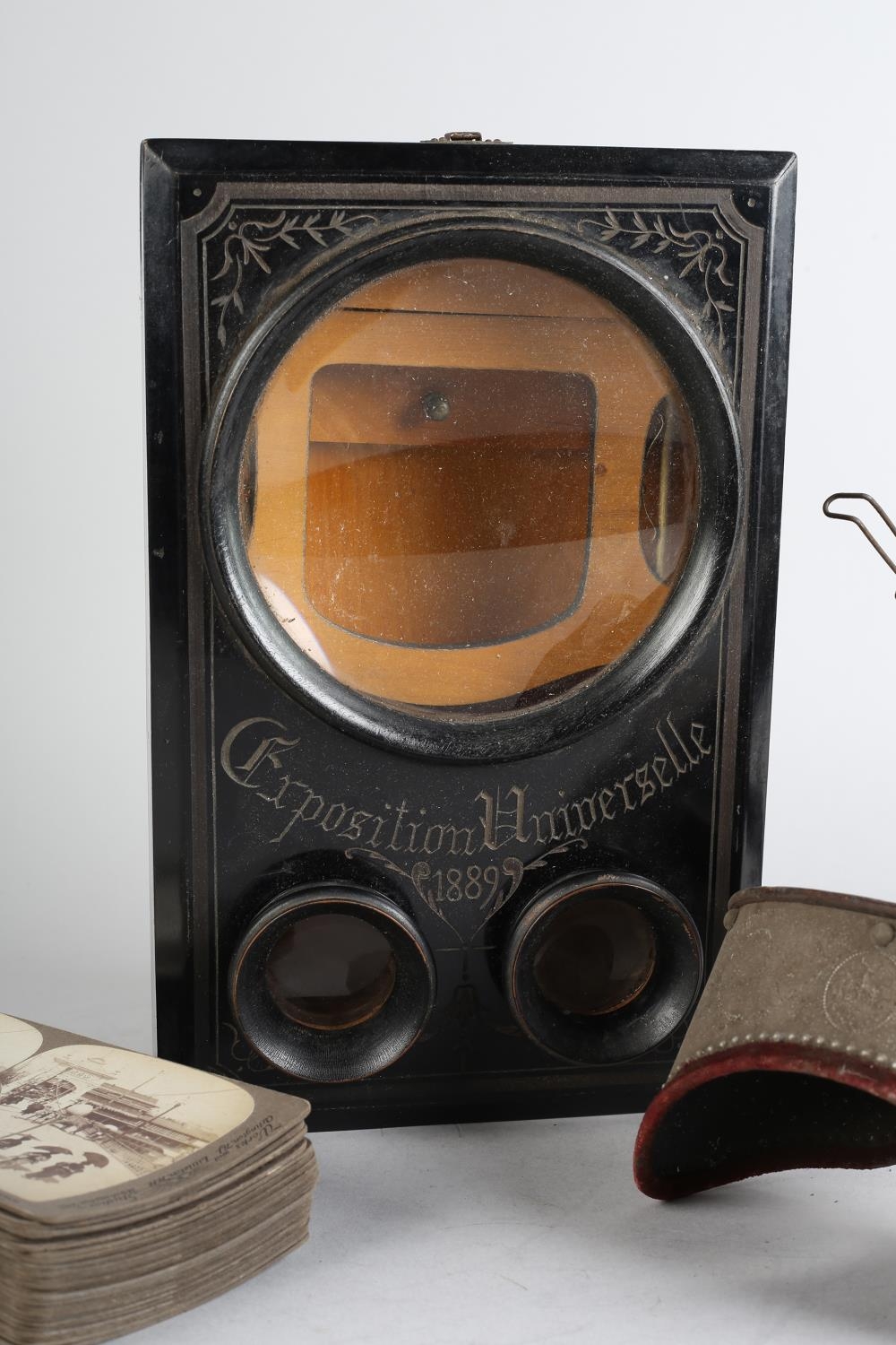 A 19TH CENTURY EBONISED GRAPHOSCOPE TABLE TOP STEREO CARD VIEWER, the cover inscribed Exposition - Image 2 of 7