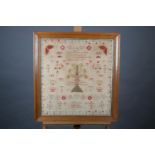 AN EARLY 19TH CENTURY SAMPLER worked in coloured silks on linen by Jane Boreman aged 12 years, 1824,